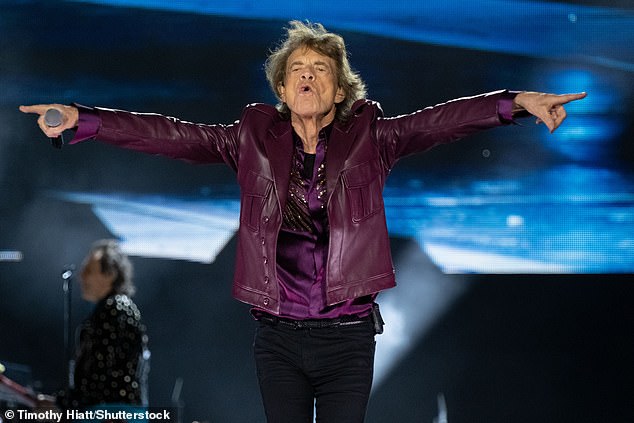 For the incredible night, Mick sported a maroon leather jacket with a matching sparkly blouse underneath.