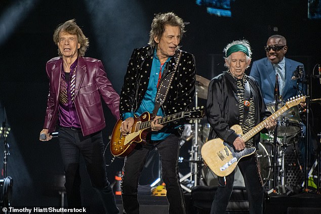 Keith and Ronnie joined him showing off their rock skills during the vibrant performance at Soldier Field.