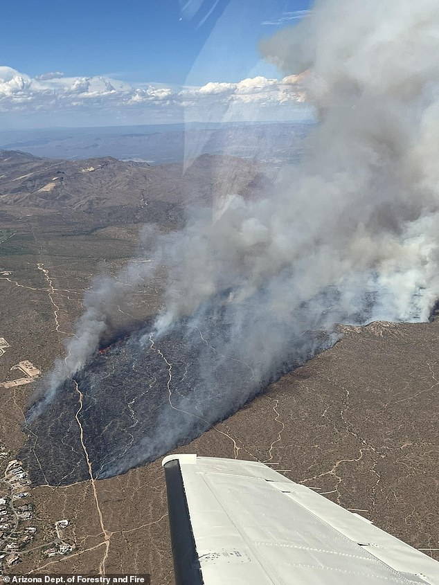 The fire started earlier Thursday and was at 0 percent containment by nightfall, fueled by winds and hot, dry weather.