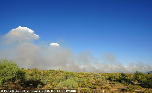 Smoke rises from the Boulder View Fire in North Scottsdale