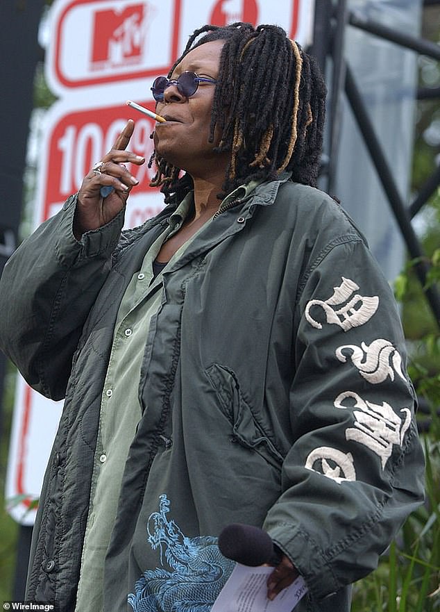 Whoopi, pictured here smoking a cigarette in 2003, has used cannabis to relieve her menstrual cramps in the past.