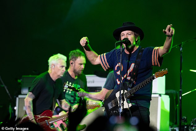 The 90s rock band were due to play Tottenham Hotspur Stadium on Saturday but left fans devastated after announcing the gig would no longer go ahead (Mike McCready, Jeff Ament and Eddie Vedder pictured in May)