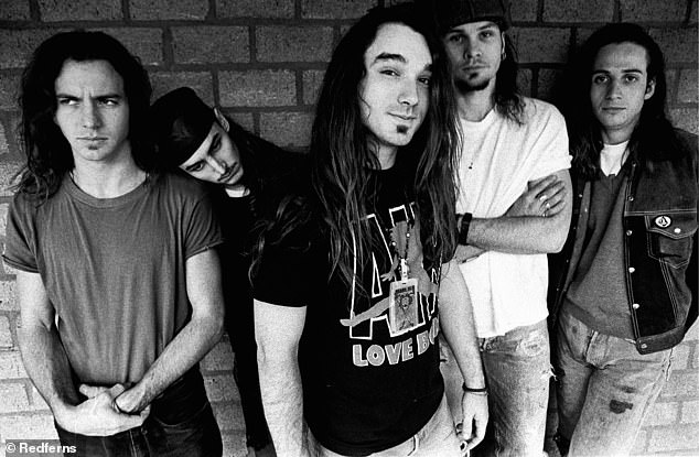 Pearl Jam consists of founding members Jeff Ament, Stone Gossard, Mike McCready and Eddie Vedder, as well as Matt Cameron, who joined in 1998 (pictured in 1992)