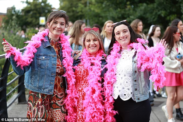 Pink feather boas, cowgirl hats and sequin ensembles were seen aplenty as fans waited patiently to enter the venue.