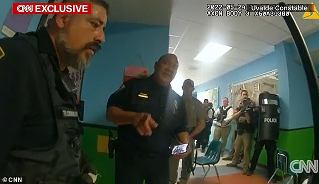 Footage showing Peter Arredondo directing armed officers inside Uvalde Elementary School