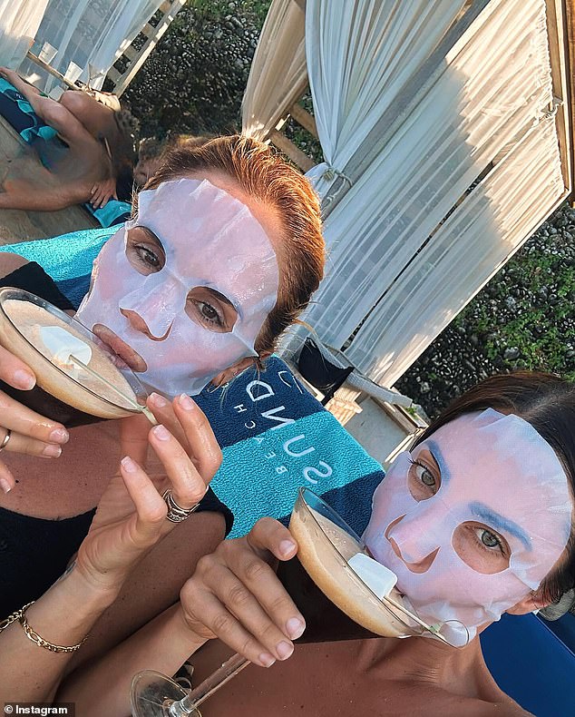 She also posted a photo of the two of them sipping an Espresso Martini and enjoying some skincare products while wearing face masks as they relaxed in the sun.