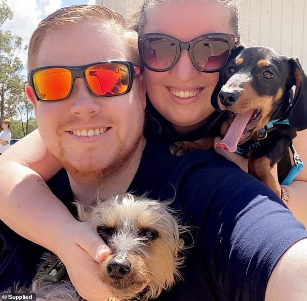 Trigg said his wife of 14 years, Kylie (pictured with their dogs) saved his life by forcing him to go to the hospital.