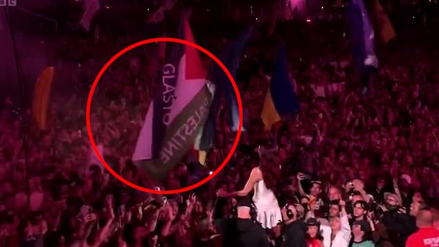 Footage from her impressive performance yesterday showed her running into the crowd to sing near a flag reading 'Glasto for Palestine', which social media users claim is a nod to her continued support for the cause.