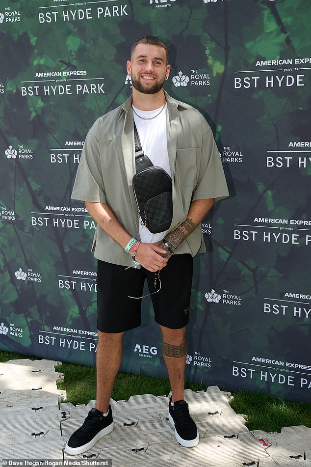 Zach was also dressed for the sunny weather, donning a casual shirt and shorts while shielding his eyes behind sunglasses.