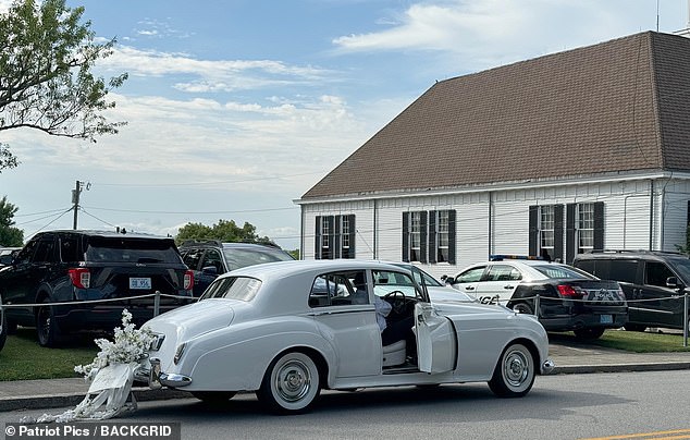 The special white wedding car was also seen.