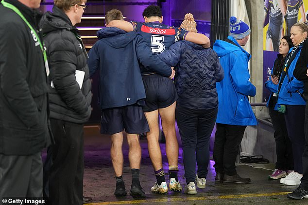 Coates limped out of AAMI Park after trying to dive for the ball