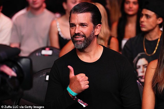 Donald Trump Jr gave a thumbs up when he was seen in the front row. He and Rodgers are big UFC fans