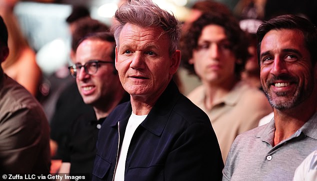 Rodgers sat next to celebrity chef Gordon Ramsey as he waited for the main card of UFC 303.