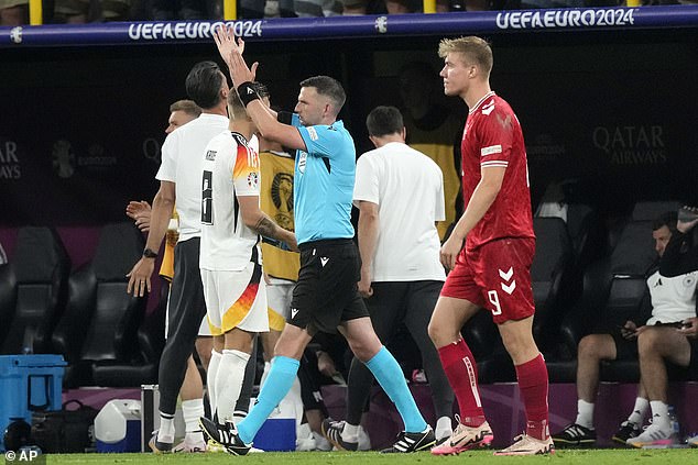 Referee Michael Oliver pointed out the spot after being advised to watch replays of the handball.