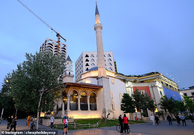 The budget tourist took a free walking tour to see the sights. Above: The Et'hem Bey Mosque in Tirana's Skanderbeg Square in the city centre.