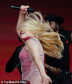 The singer rocked out and shook her long hair wildly during the energetic set.