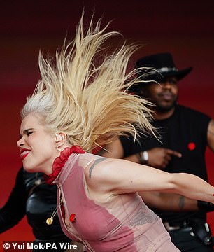 The singer rocked out and shook her long hair wildly during the energetic set.