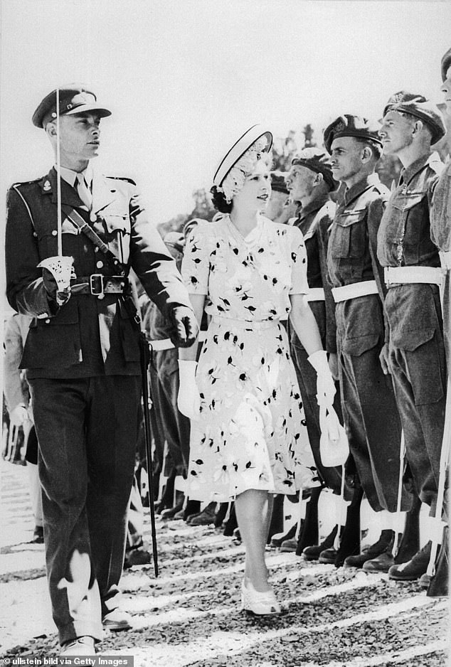 Elizabeth II gave her speech during a six-month tour of South Africa. Above: The Princess reviews an honor guard in the country during the trip