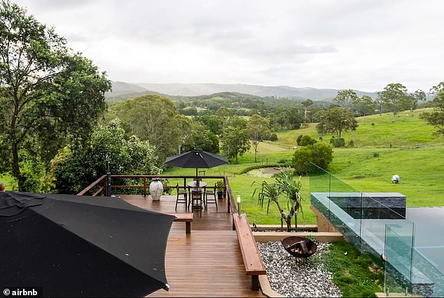 A separate patio is a lovely setting for al fresco dining with rolling hills towards the mountain ranges.