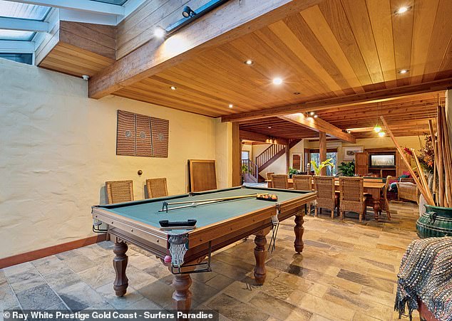 The billiard room, right next to one of the several dining rooms, is a great place for family and friends to gather.