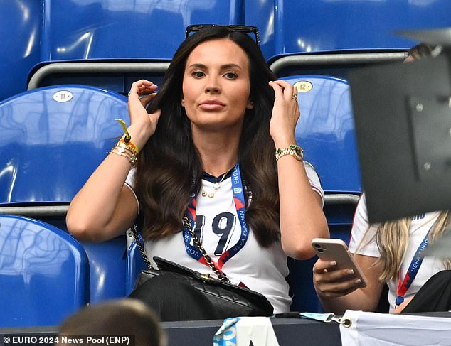 Ellie Alderson, Ollie Watkins' girlfriend, took her seat before kick-off of the crucial match at 5pm GMT.