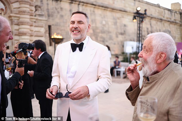 David was also seen with fellow English star and acclaimed writer and director Mike Leigh, 81, as guests enjoyed drinks ahead of the ceremony.