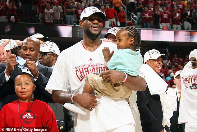 LeBron (pictured in 2007 with Bronny) has often spoken of his desire to play with his son.