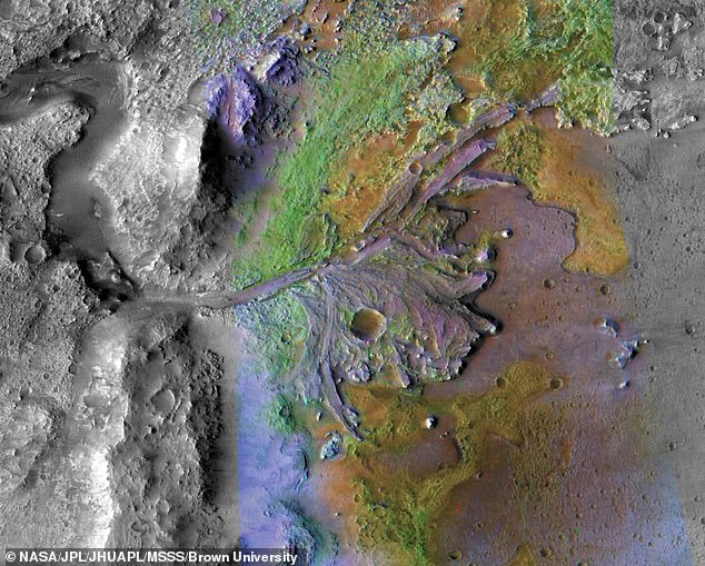 In our own solar system, some scientists hope to find traces of ancient life in Mars' Jezero Crater (pictured), which is thought to be the bed of a dry lake.