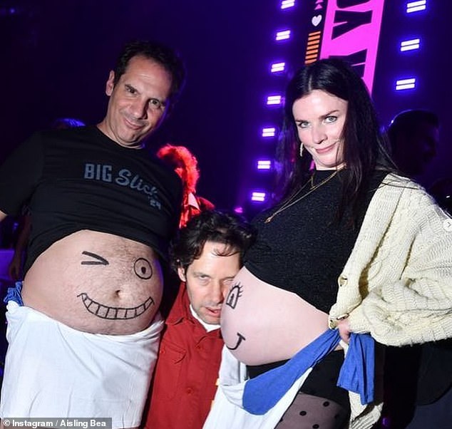 Showing off her baby bump, Aisling shared hilarious videos and snaps of a cartoon face painted on her bare belly after performing a backup dance with comedian Seth Herzog.