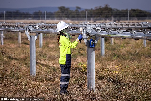 The Coalition has argued that remaining committed to the Paris Agreement is doomed to fail, while destroying Australian industry in the process (pictured, a solar farm in Gunnedah, New South Wales).