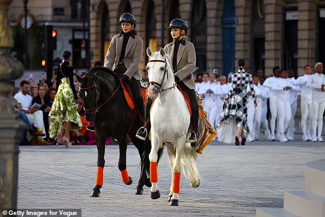 Meanwhile, Kendall Jenner and Gigi Hadid marked their own runway firsts when they rode into the Vogue World Paris show.