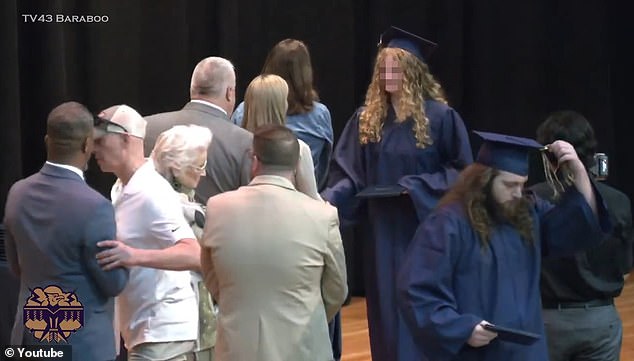 Matt Eddy, 49, took the stage at his daughter's high school graduation to avoid the superintendent from shaking his hand.