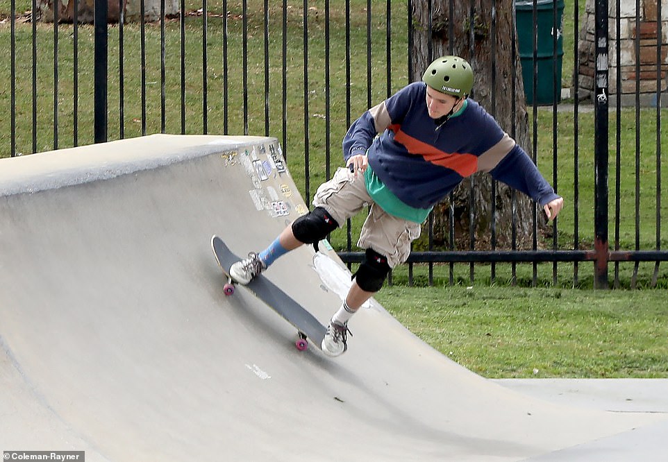 Fin, who came out as non-binary in April, was practicing various skate tricks, including ollies and riding a ramp.