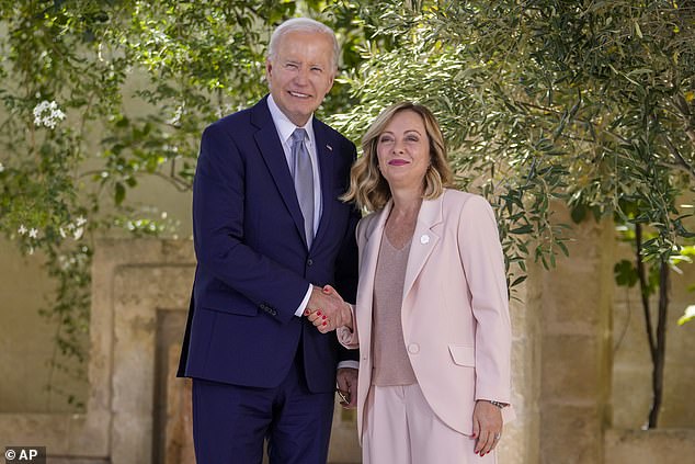 Maher noted that Italian Prime Minister Giorgia Meloni (pictured with Joe Biden at the G7 meeting on Thursday) was often called a fascist for some of her far-right positions, but argued that moderate parties were allowing her