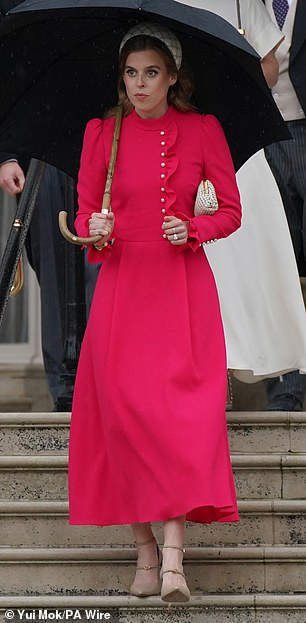 Princess Beatrice brought much-needed cheer to a rainy afternoon in her crimson 'Christina' dress