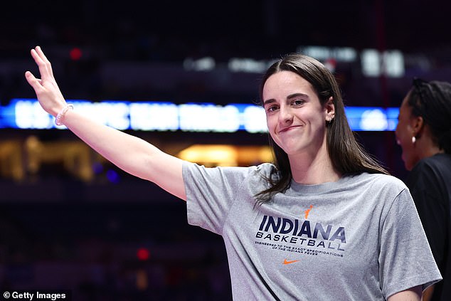 Clark waved to the crowd when she was introduced at the US Swimming Trials the night before.