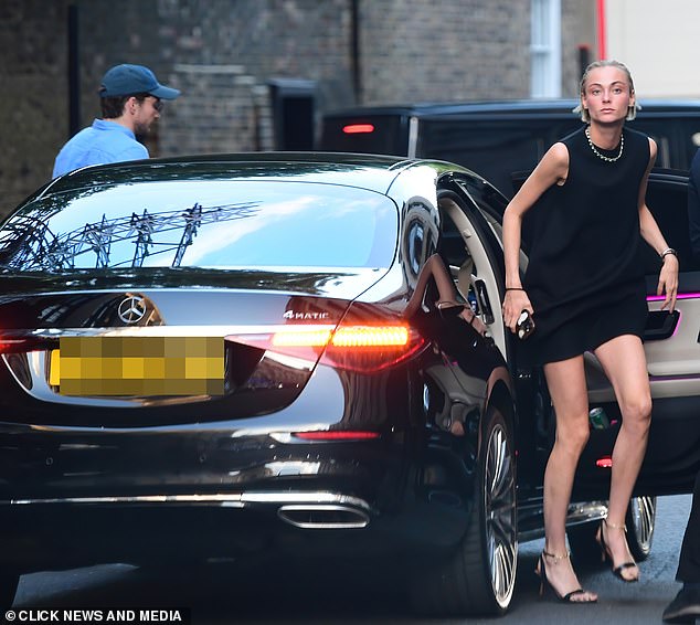 The blonde beauty looked stunning as she got out of the car.