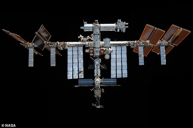 Bottom view of the International Space Station (ISS) in November 2021, which maintains an orbit approximately 400 kilometers (250 miles) above Earth.