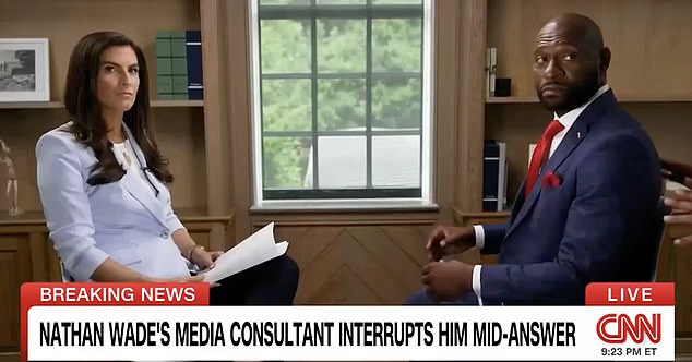 Trump's former special counsel Nathan Wade (R) was in the middle of an interview with CNN's Kaitlan Collins (L) on Wednesday when he was suddenly interrupted by a 'media consultant' after he was asked when his relationship with him began. Fani Willis.