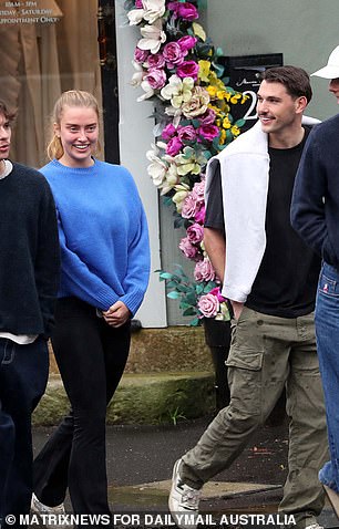 Grace looked smitten with her boyfriend as they spent quality time with their friends.