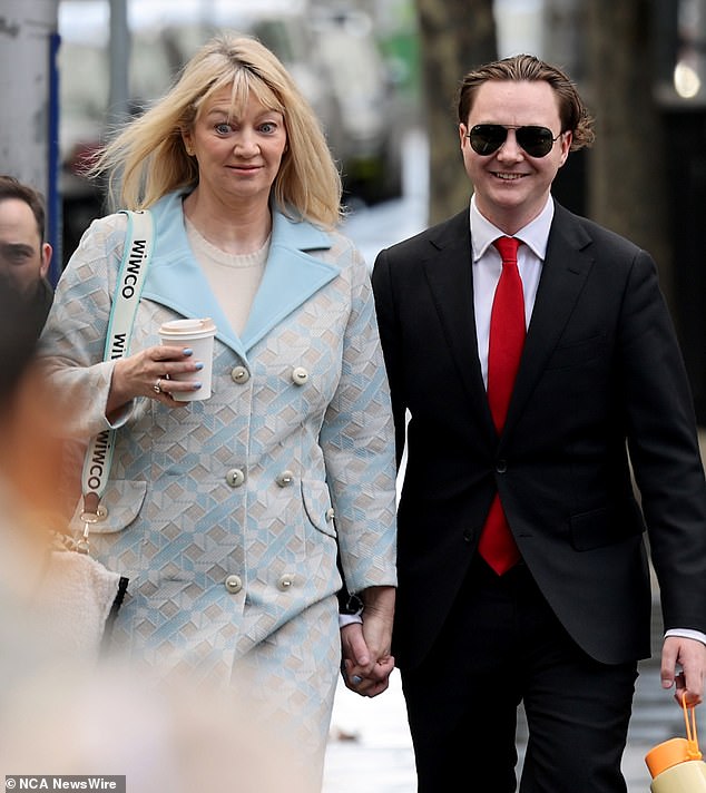 Greg Lynn's second wife Melanie (left) and Lisa's son Geordie arrive at court during Lynn's trial.