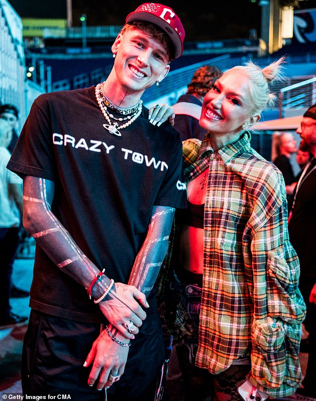 MGK, born Colson Baker, wore a black 'Crazy Town' t-shirt and a red cap.