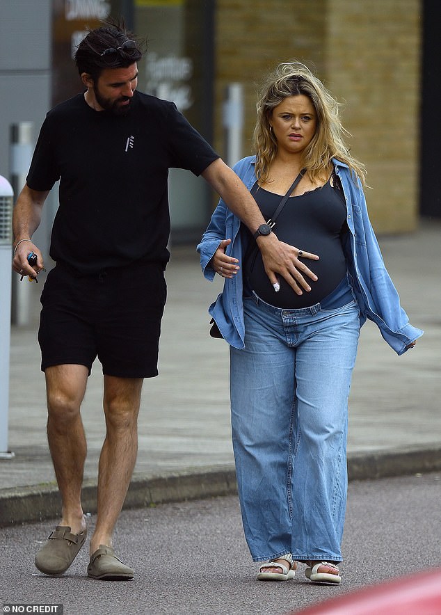 The TV presenter, 37, who revealed she was six months pregnant in March, was spotted with her scientist boyfriend Alistair Garner, 37.