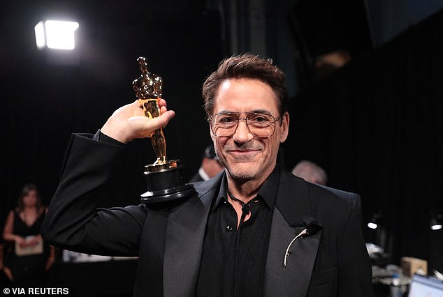 It's Robert Downey Jr! The star, now 59, won his Best Supporting Actor Oscar in 2024 for his role as Rear Admiral Lewis Strauss in Oppenheimer.