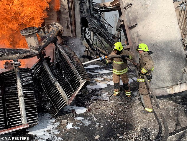 The missiles hit power facilities from Odessa, the Black Sea resort in the south, to Kovel, a medieval city near the border with Belarus in the north, knocking about 40 percent of the energy infrastructure out of commission. In the photo: Firefighters in the Rivne region.