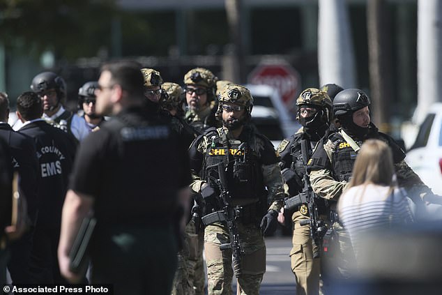 A large number of law enforcement officers invaded the hostage situation at the Bank of America building at the Bell Tower Shops in Fort Myers, Florida.