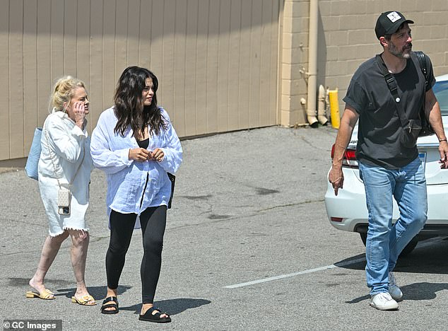 The Tony Award winner, 48, walked in front of his future wife and her mother, Nancy Lee Bursch, who was wearing a white button-down dress.