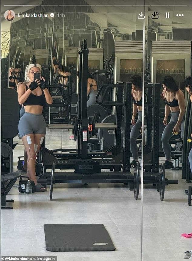 Earlier in the day, the SKIMS founder shared a mirror selfie in her home gym with fitness trainer, Senada Greca.