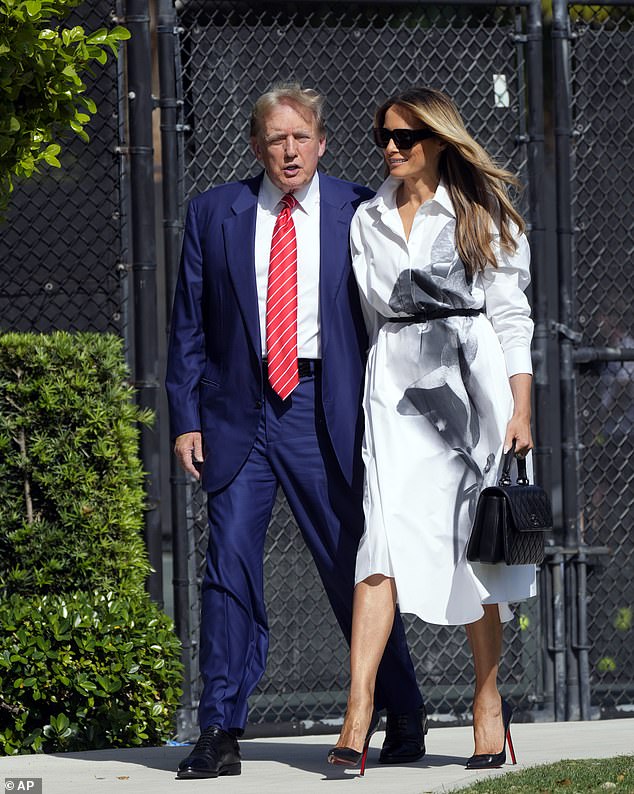 Melania Trump smiles on March 19 as she accompanies the former president to vote in the Florida Republican presidential primary in Palm Beach, Florida. When she was asked about the campaign, she said 