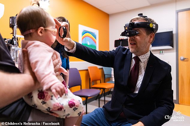 The Artales took their daughter to see Dr. Rychwalski (pictured), who performed three surgeries in Madison over nine months, including two when she was a newborn, which saved her vision.